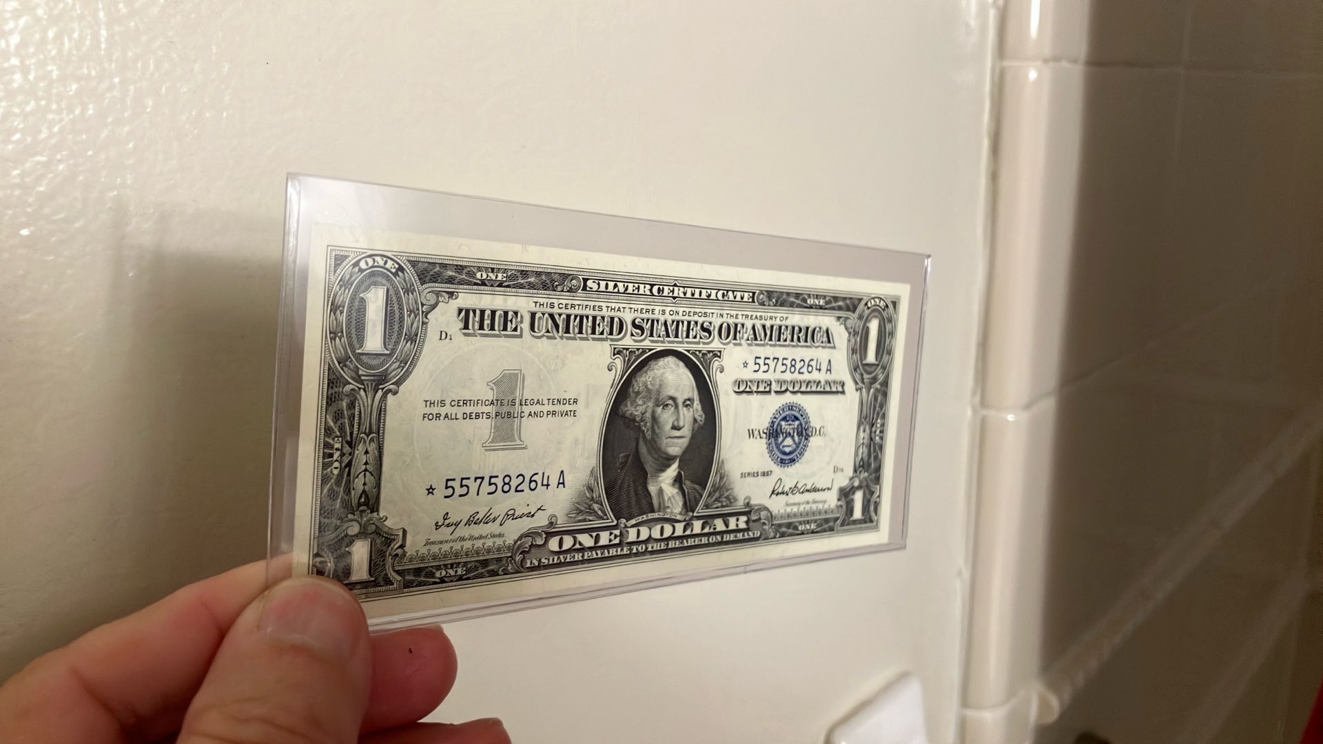 1957 one dollar silver certificate star note. Choice crisp uncirculated.