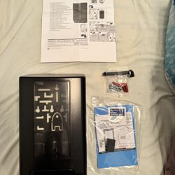 Diversey IntelliCare Manual Black Soap or Sanitizer Dispenser D1224722 in Black