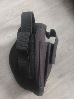 Assorted holsters for Glock and large service revolver