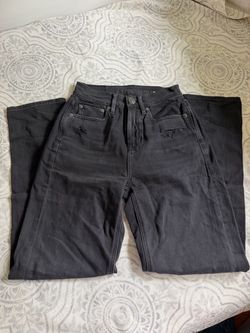 American Gray washed denim jeans with a sky high rise and button fly. Size 12 with belt loops and front pockets. Light wear, good condition. Eagle Bla