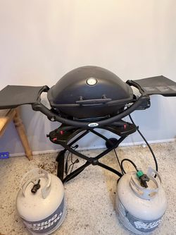Weber portable grill on wheels