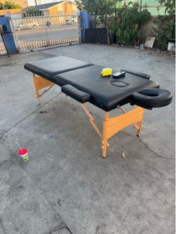 Massage table