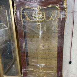  Curio French Display Cabinet LOOK UP This is a French-style display cabinet with gold accents. TIME PERIOD Early-Mid 20th Century ORIGIN France  HIST