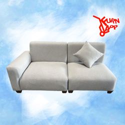 Light gray mid-century modular sofa