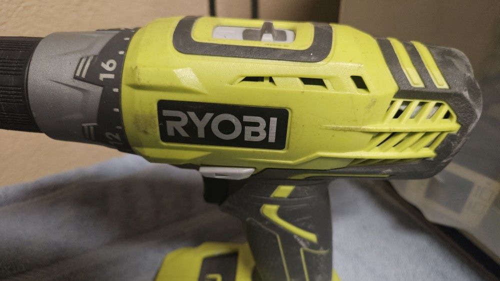 Ryobi Standard & Impact Drill Set & Handheld Brushless Saw. Three Batteries Included