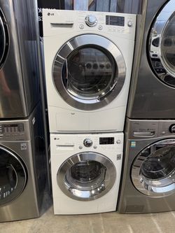 LG white front load washer and electric 220 volts ventless dryer set 24 inches