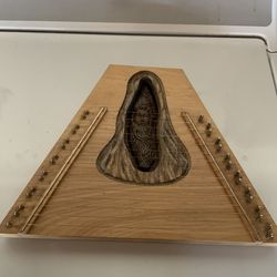 Cave man harp instrument