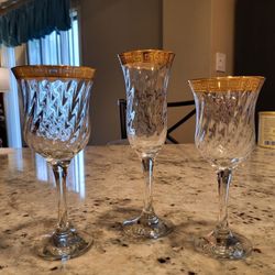 Gold Rimmed Wine And Champagne Glasses