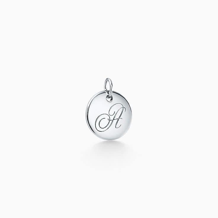 Tiffany Co Letter A Initial Alphabet Disc Charm Pendant in Sterling Silver.