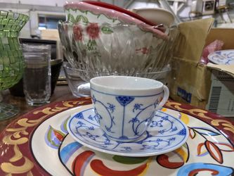Set Of Blue And White Tea Cups And Saucers