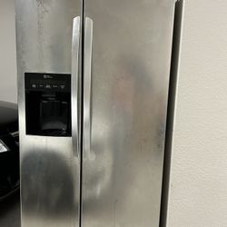 Free refrigerator for pick up- Not cooling 