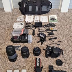 Canon eos rebel t3i bundle with 2 lenses, battery grip etc