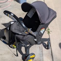Doona Stroller Carseat Black/Yellow Expiration: 06/2026 