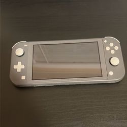 Grey Nintendo Switch Lite. Used Good Condition 