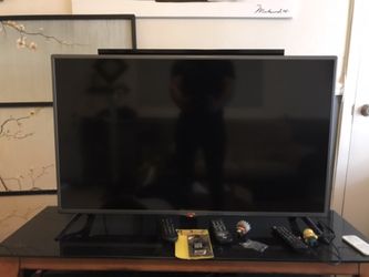 32 inch tv with tv stand available