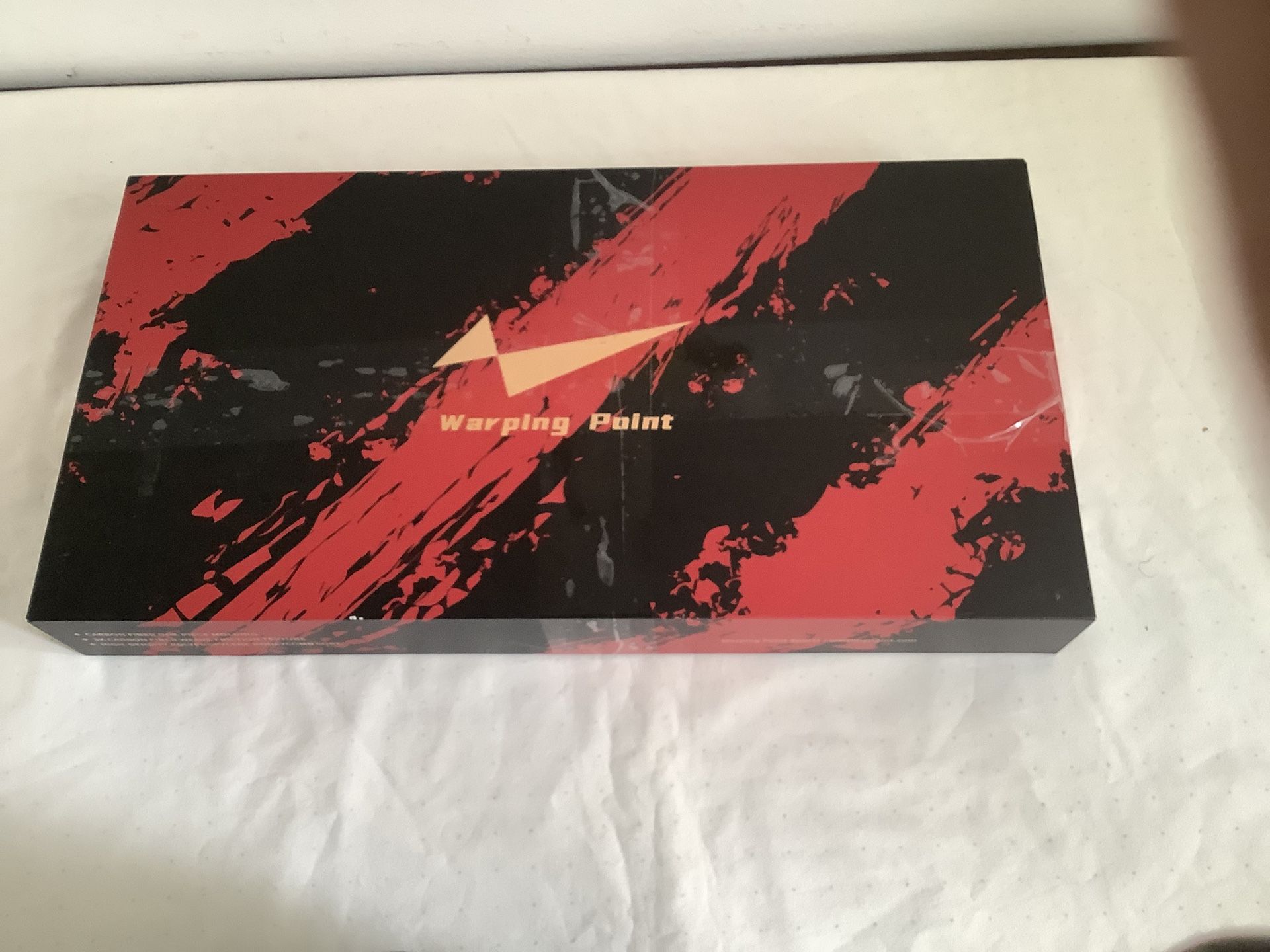 Carbon fiber racket and accessories / Warping Point