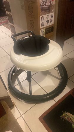 2 way baby Walker price 20$. Pick up. E. Side 72. and. Grandview. E.   Tacoma