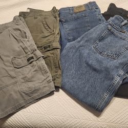 Three Pairs Of Men's Jeans And Two Pairs Of Shorts