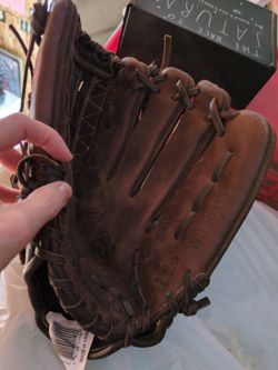 Brown leather Wilson baseball mitt