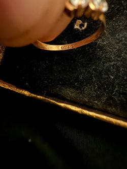 18k diamond ring (size 5 I believe)