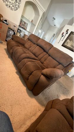 Sofa with recliners on each end