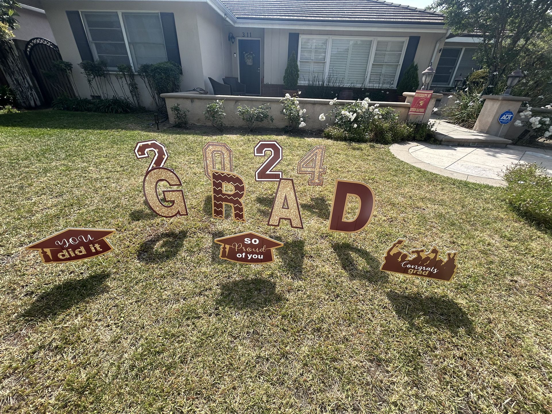 2024 Grad Lawn signs and  2024 Grad mini  candy wrappers 