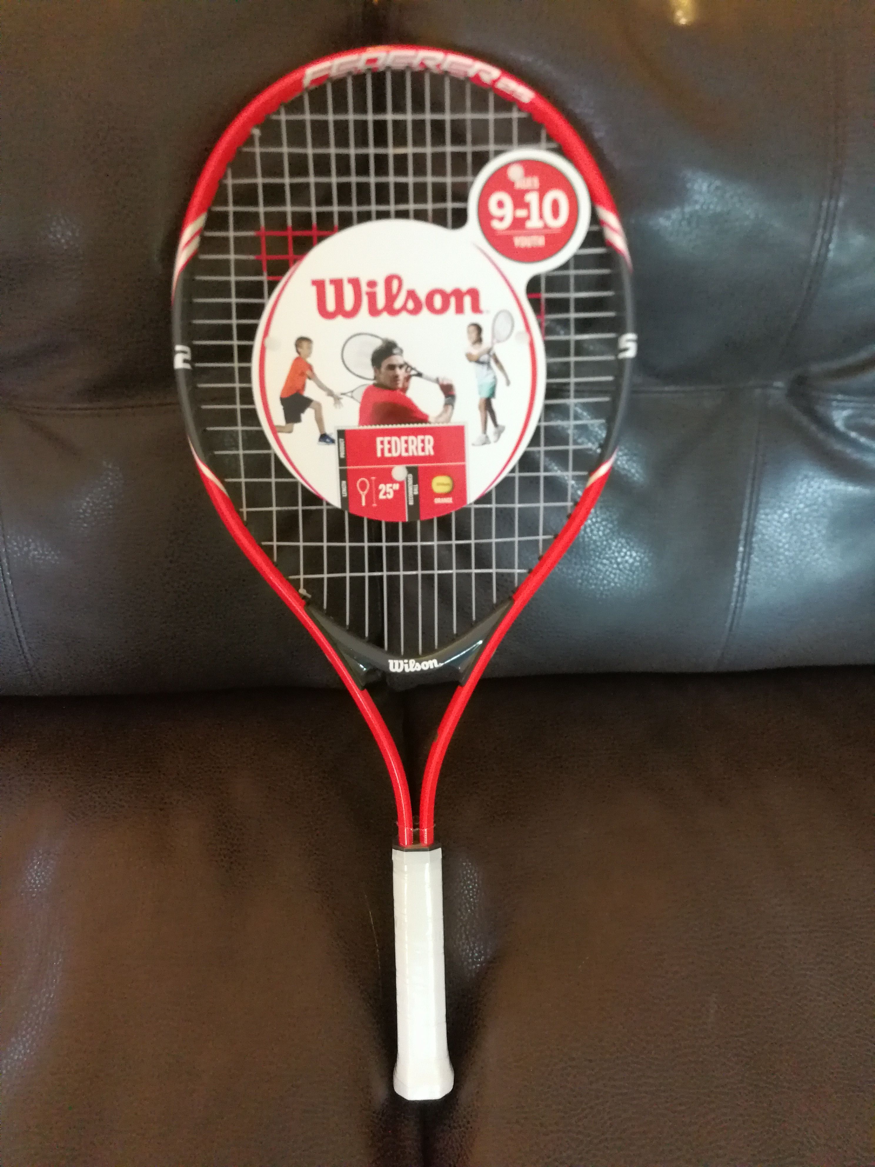 Brand new tennis racket for ages 9-10