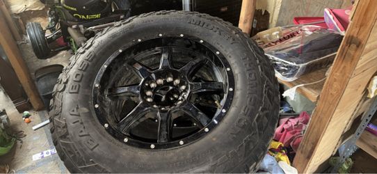 Mickey Thompson Baja Boss A/T Tire on Black Wheel