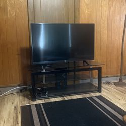 Tv and TV Stand 