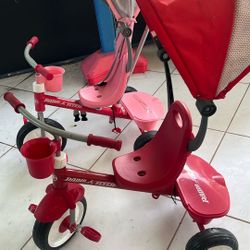  $20 Each BOY AND GIRL Radio Flyer Kid’s Steer & Stroll Trike, Red  Adjustable Seat, Storage Bin, Bell, Steel Frame
