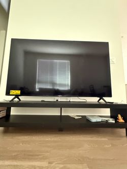 Table and 65” LG  TV