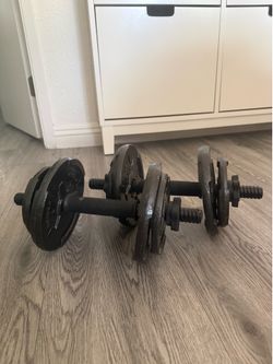 Pair of 2.5- 7.5 lbs WEIDER iron weights