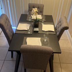 Dining Room Set Includes Black Kitchen Table And Four Grey Chairs. New Condition! 