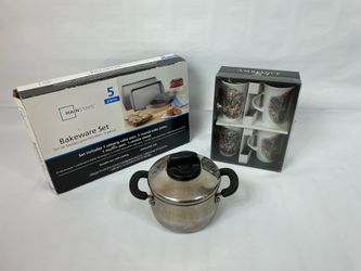 -New main stream baking pan set.  -New 4  coffee cups it. -Used  stainless steel pot with Straining top.             Tags: Kitchen pot pans cooking ba