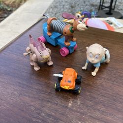Vintage 1990s Wind-Up Toy Lot – Rugrats, Toy Story, Land Before Time, McDonald’s  ⸻  Description:  Lot of 4 original vintage 1990s wind-up toys, all i