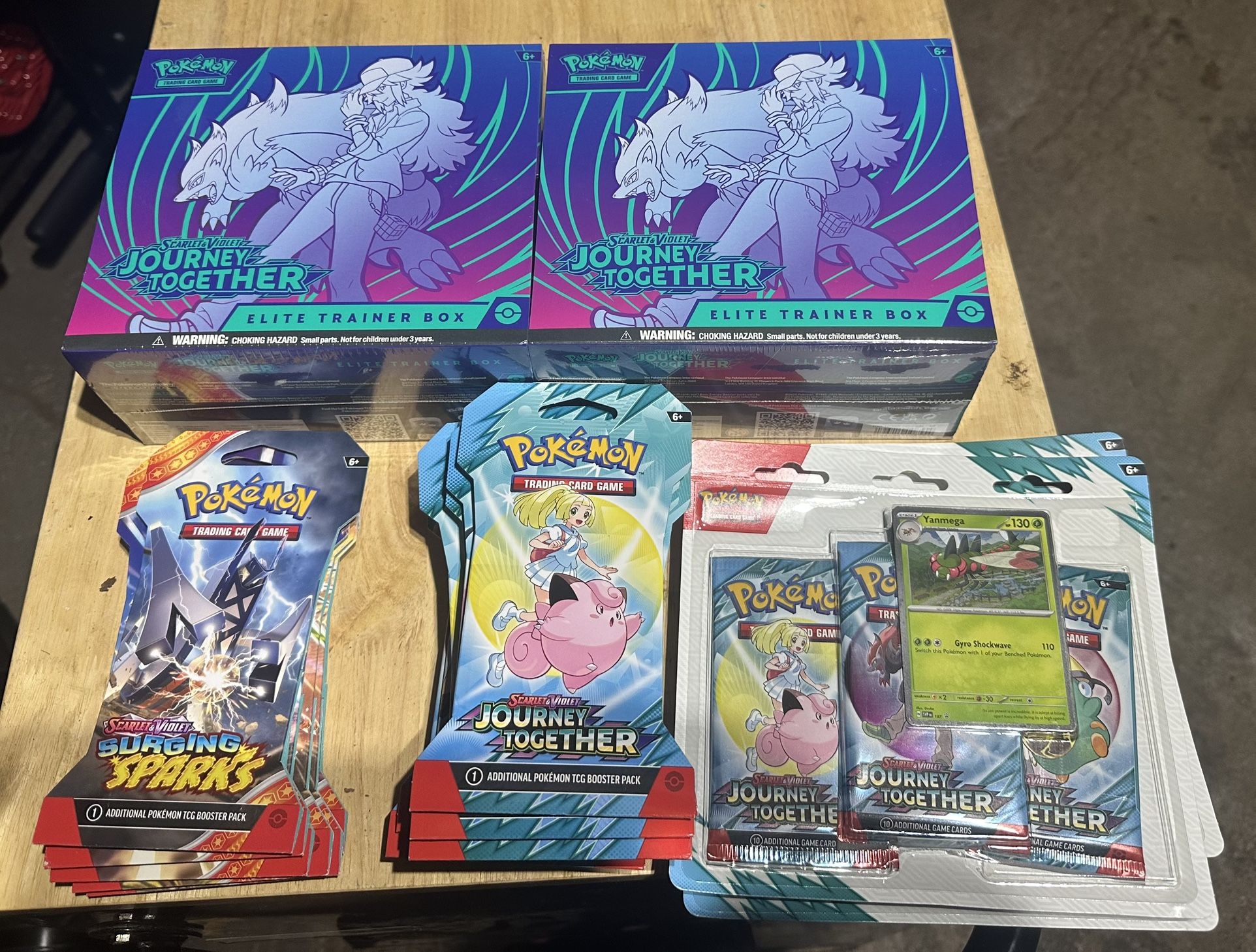Pokémon cards journey together & surging sparks