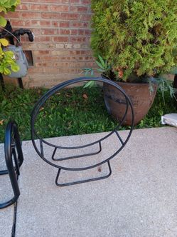 Black tubular steel firework log hood