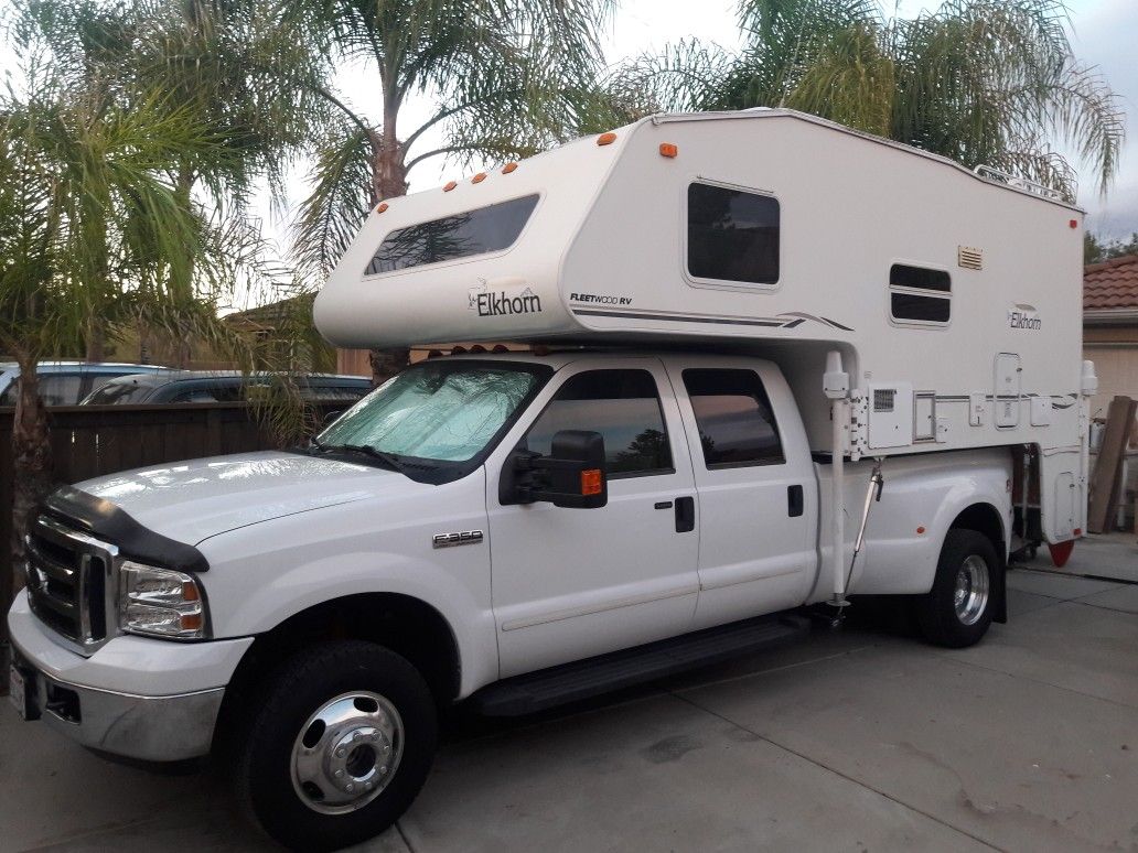 Over cab camper / RV one of the largest ones they make with a dining ...