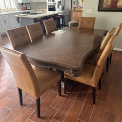Large wood dining room table w/ 8 chairs