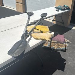 Kayak Paddles And Life Jacket 