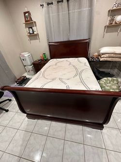 Cherry wood full size bed frame, mattress, box spring, and night stand
