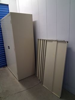 Solid metal storage cabinet missing key