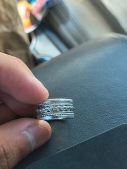 925 silver ring with rope design in middle