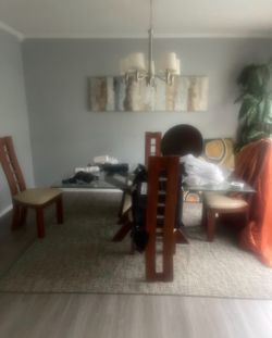 dining room glass table with 4 chairs IF U PICK UP TODAY 100$ off NEED GONE