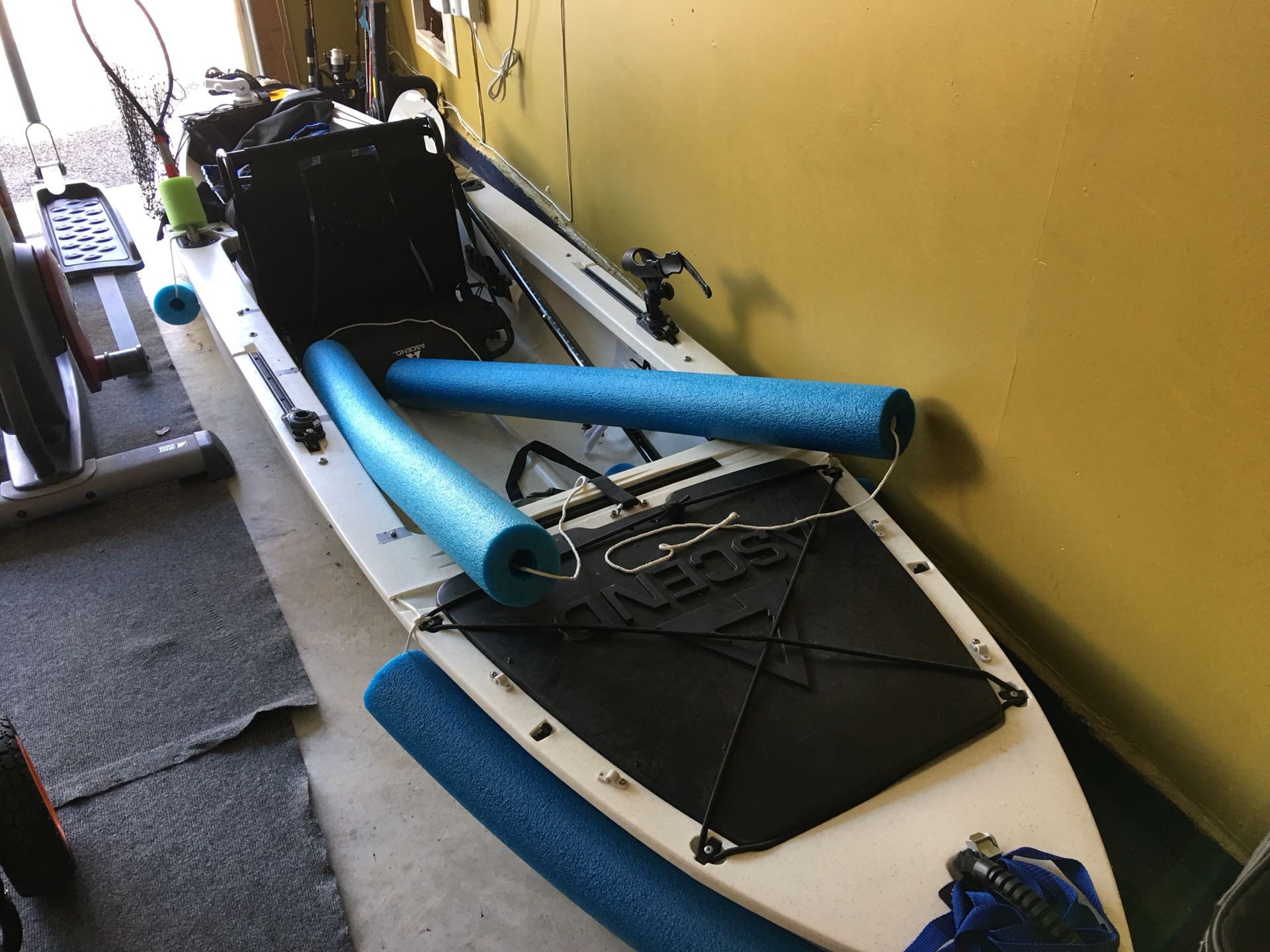 Ascend H12 hybrid kayak. Used three times, garage kept, perfect condition. Price-$500 firm, includes oar(upgraded), and other accessories!!