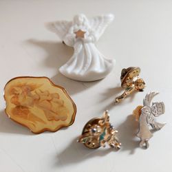 Vintage Set of 5 Religious Angel Cherub Lapel Pins Brooches.  One white porcelain angel brooch, one silver meltal angel pin, one gold with enamel ange