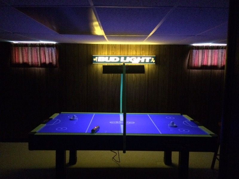 Black lit air hockey table