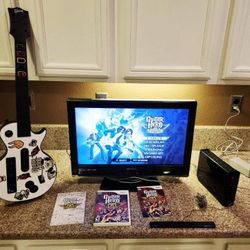 Black Nintendo Wii Set with a LIKE NEW Guitar Hero Aerosmith Smith **Tested & Working**