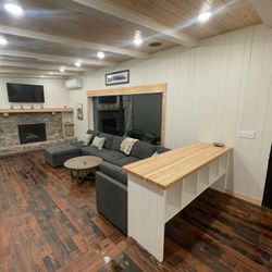 1550 ft.² of pine wood black stain scraped finish flooring at $3.50 per square foot