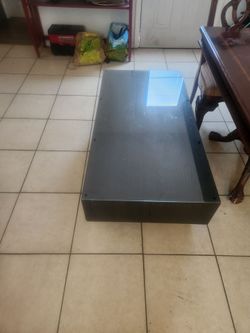 Glass top coffee table best offer